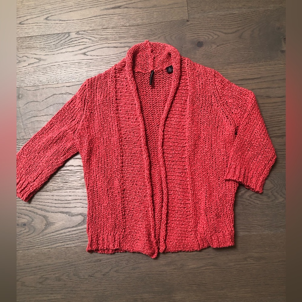 Women’s Isda & Co sweater with three quarter length sleeves.